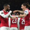 ARSENAL PLAYERS CELEBRATING AGAINST ATLETICO MADRID