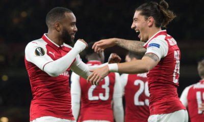 ARSENAL PLAYERS CELEBRATING AGAINST ATLETICO MADRID