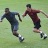 Unai Emery and Alexandre Lacazette in training