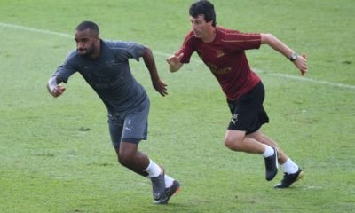 Unai Emery and Alexandre Lacazette in training