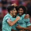 Arsenal midfielder Mesut Ozil and Elneny In Singapore