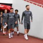 Arsenal players entering the pitch