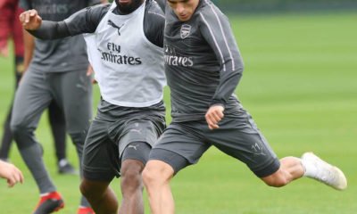 Lacazette and Torreira in training