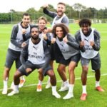 Arsenal players lineup for a picture