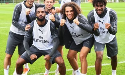 Arsenal players lineup for a picture