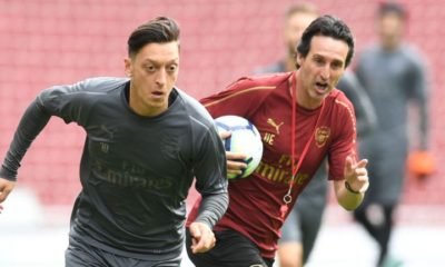 Unai Emery and Mesut Ozil